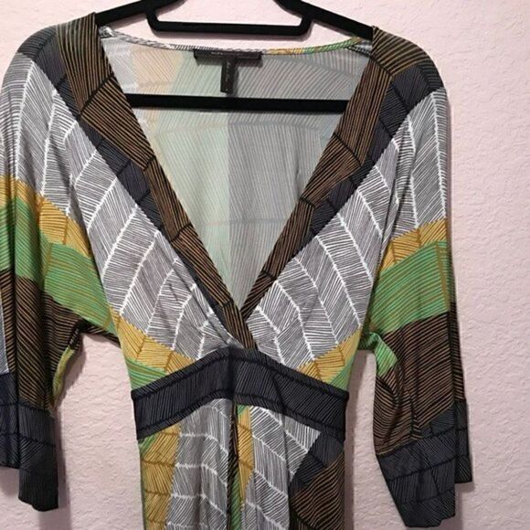 NWOT. BCBGMAXAZRIAâdressâ
tiesâ
onâ
theâ
back. - Picture 9 of 10